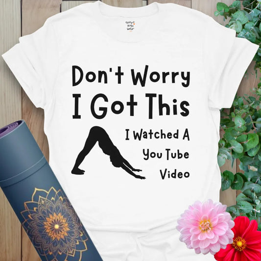 Crisp white yoga t-shirt with minimalist affirmation design for strength, softness, and clarity.