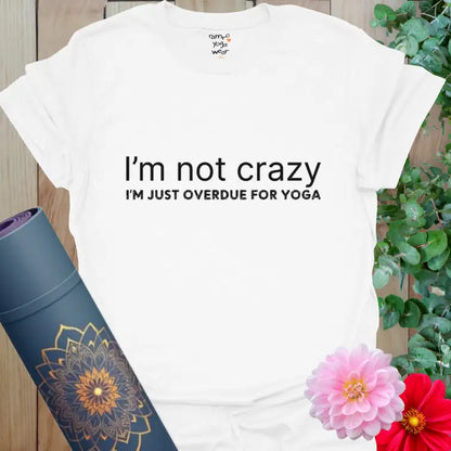 White Im Not Crazy T-Shirt with minimalist text design: “I’m not crazy. I’m just overdue for yoga.” Soft, lightweight yoga shirt for everyday calm and mindful humor.