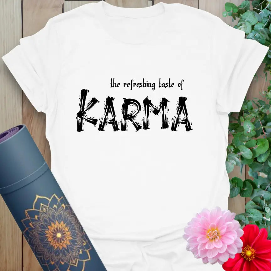 Clean white unisex yoga t-shirt with bold red "KARMA" design and playful conscious living message.