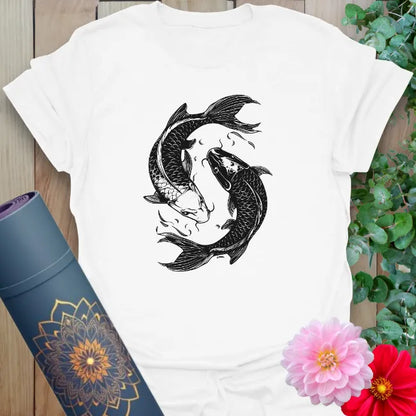 Clean white unisex yoga t-shirt featuring swirling koi fish artwork symbolizing strength, resilience, and inner peace.