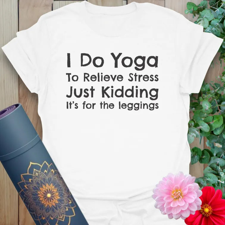 Clean white unisex yoga t-shirt showcasing playful quote about yoga, stress relief, and leggings love.