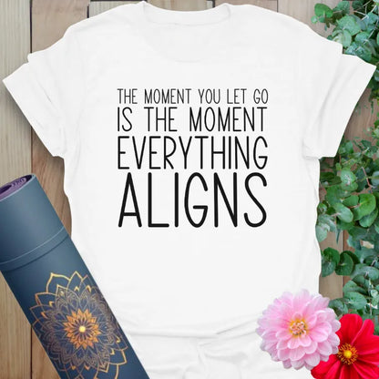 Clean white unisex yoga t-shirt featuring uplifting alignment affirmation for heart-centered, soulful daily inspiration.