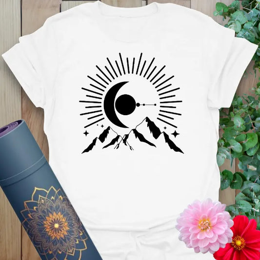 Clean white unisex yoga t-shirt featuring cosmic moonrise design over mountains for heart-centered, adventurous living.