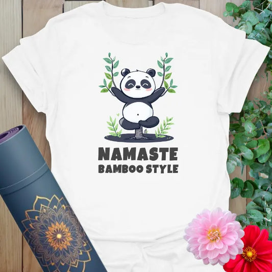 Clean white unisex yoga t-shirt featuring joyful panda illustration and lighthearted yoga humor for soulful, happy living.