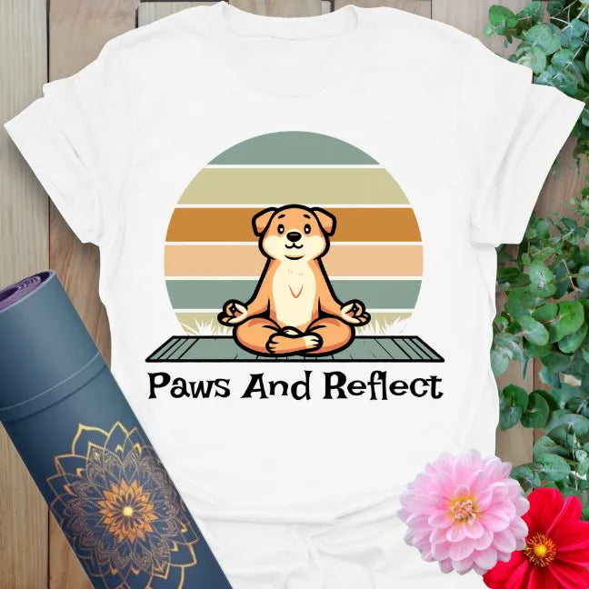 Clean white unisex yoga t-shirt with cheerful dog meditation artwork encouraging reflection and conscious living.