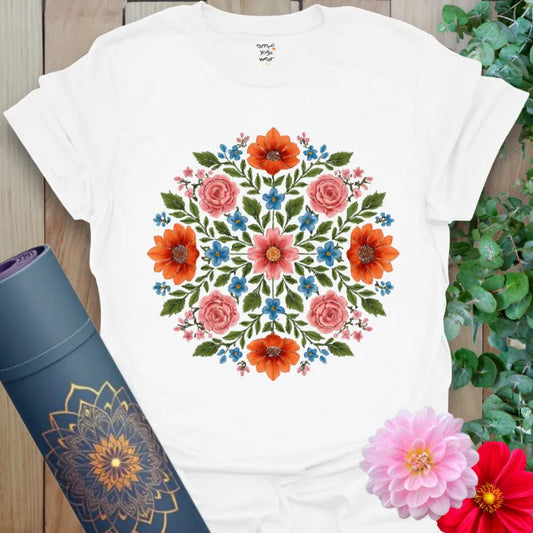 Clean white unisex yoga t-shirt featuring colorful floral prism design embodying joyful growth, balance, and natural harmony.