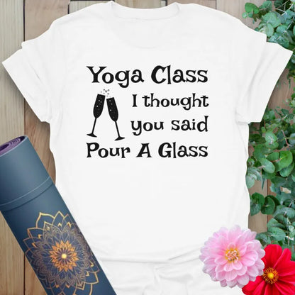 Clean white unisex yoga t-shirt with playful wine and yoga humor inspiring light-hearted mindful living and conscious celebration.