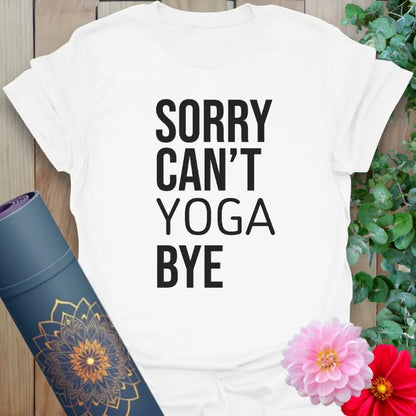Clean white unisex yoga t-shirt with bold yoga quote showcasing playful priority-setting and yogi humor.