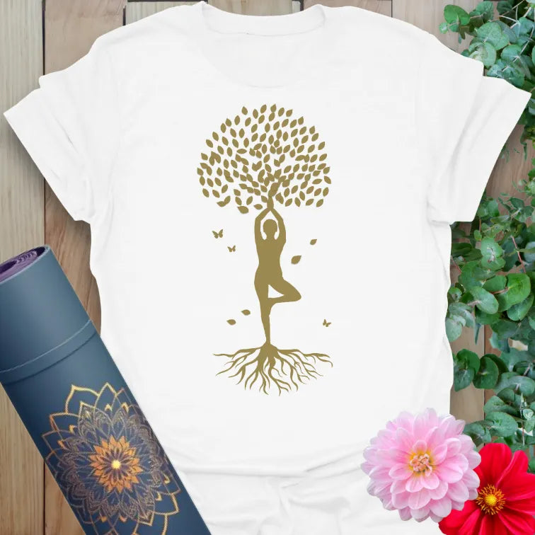 Clean white unisex yoga tee with golden yoga design symbolizing balance, growth, and connection to nature.