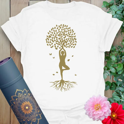 Clean white unisex yoga tee with golden yoga design symbolizing balance, growth, and connection to nature.