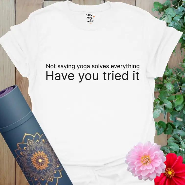 White Tried It T-Shirt with minimalist quote: “Not saying yoga solves everything — Have you tried it.” Yoga humor tee for mindful movement and everyday balance.