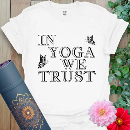Clean white unisex yoga tee with bold lettering and subtle butterfly art, ideal for yoga lovers and mantra-minded souls.