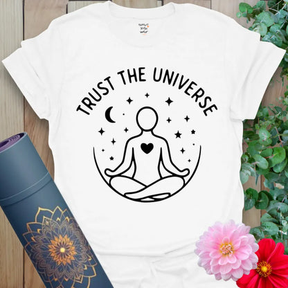 Clean white unisex tee with peaceful yogi figure and night sky design for universal faith and conscious style.