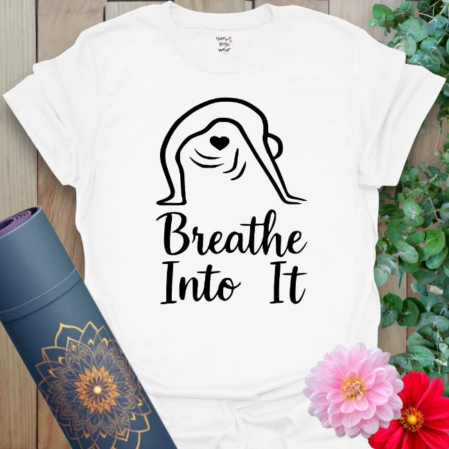 Clean white unisex tee with mindful breathing message and yogi design for conscious, quiet strength.