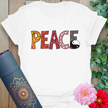 Clean white unisex tee with colorful “PEACE” word art and balance symbol for peaceful, playful style.