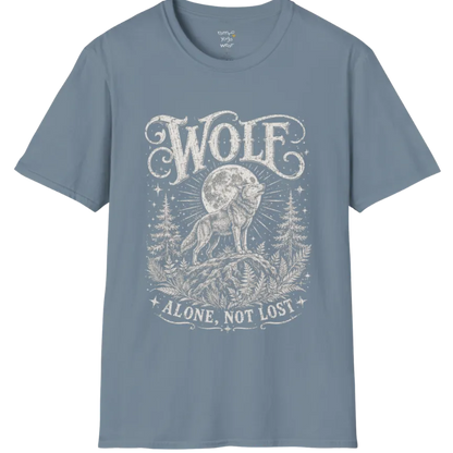 A short sleeved tee designed with a lone wolf on a ridge beneath a full moon, pine and fern framing — Wild Animals collection by Ramro Yoga Wear in Stone Blue
