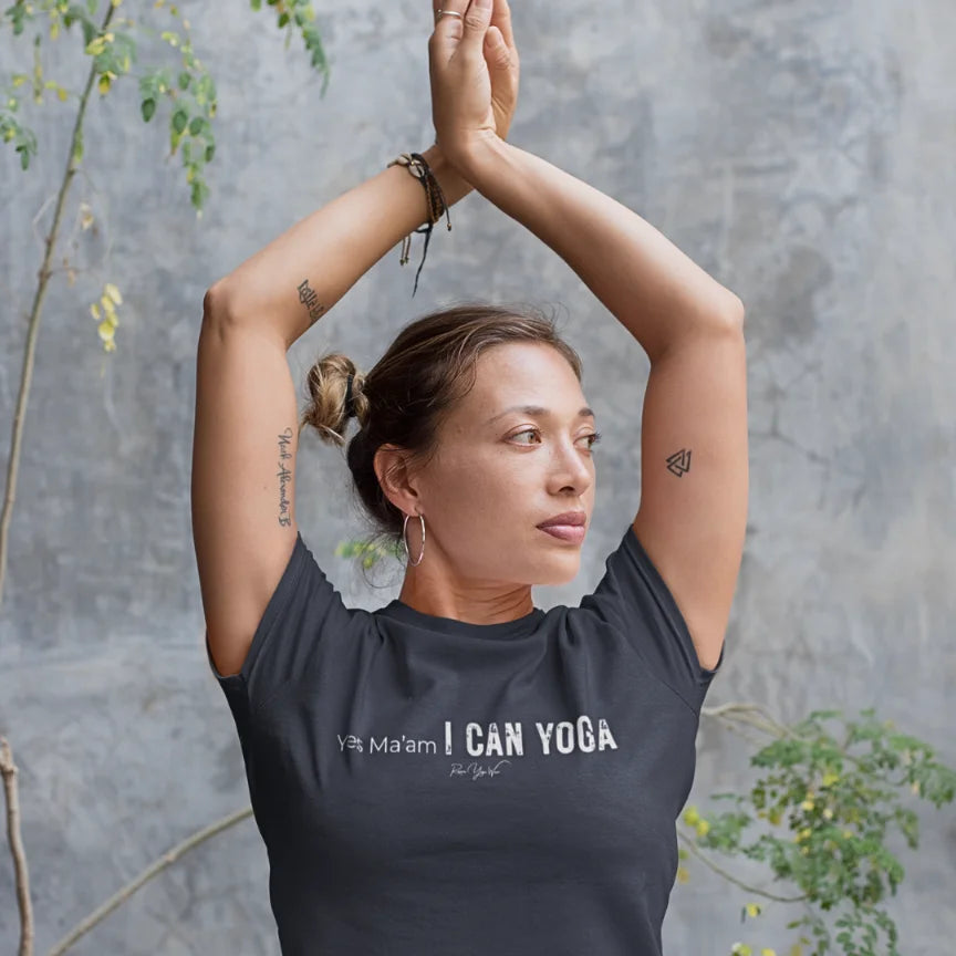 Person wearing Maam Heather Midnight Navy tee, arms raised overhead in Tree Pose, during practice — Funny Yoga Shirts collection by Ramro Yoga Wear